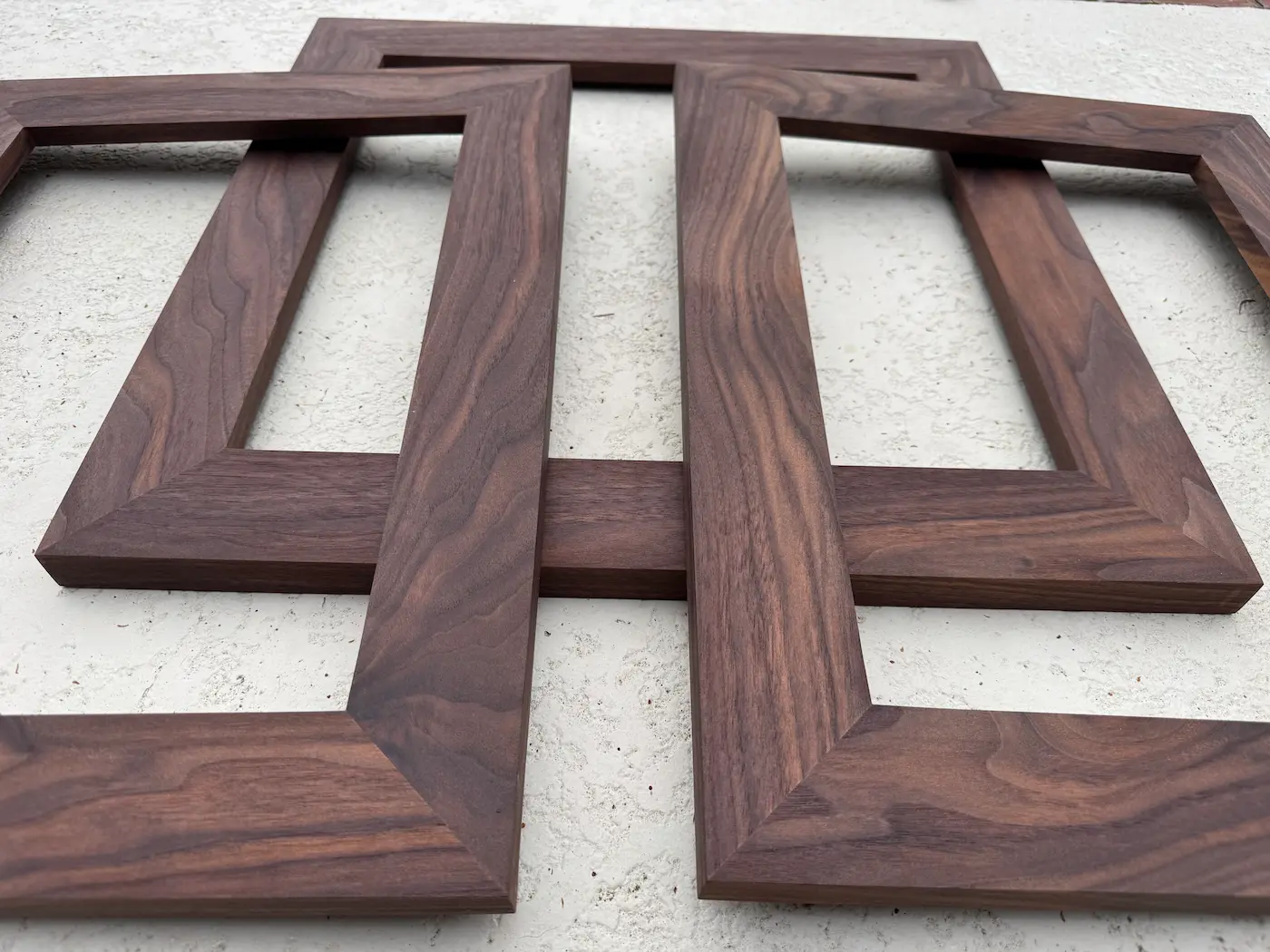 Three walnut frames